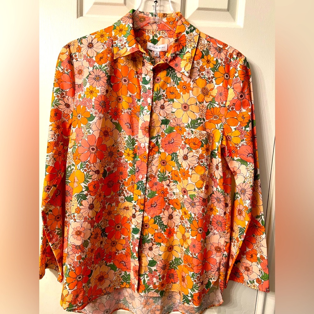 Wildflowers Shirt has a camp collar, front button closure, boxy fit, pocket